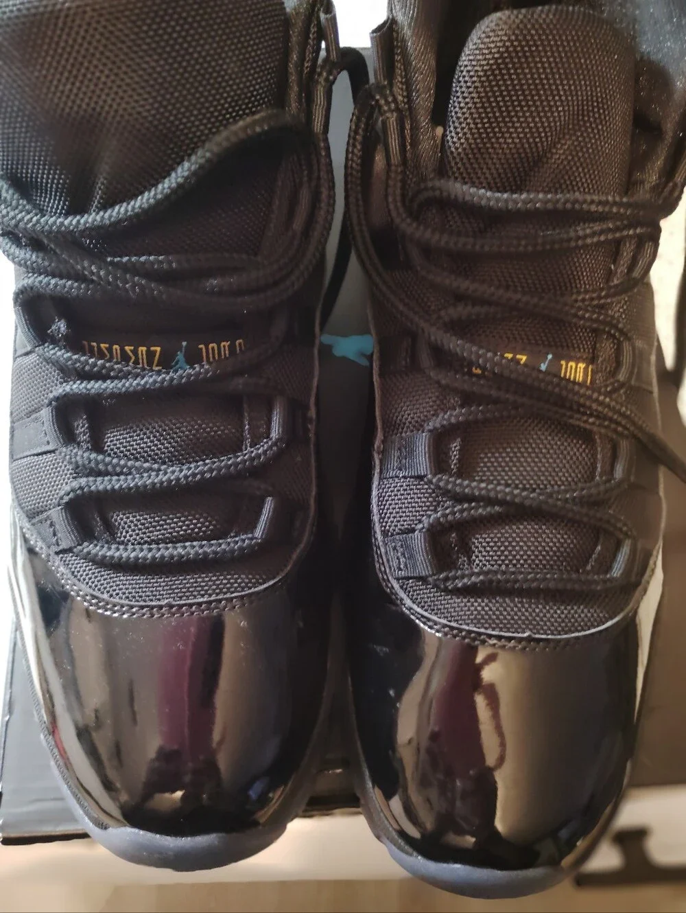 Jordan 11 Retro Gamma Blue/Black Patent Leather Sneakers with Light Blue Jumpman